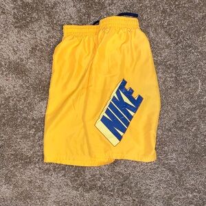 Nike Vibrant Yellow Shorts with Blue Logo
